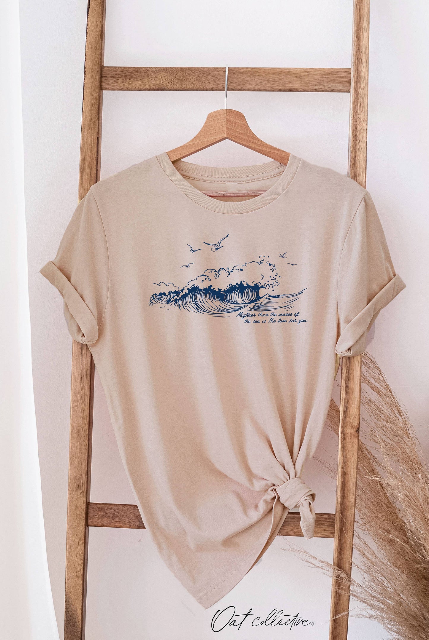 MIGHTIER THAN THE WAVES Graphic T-shirt
